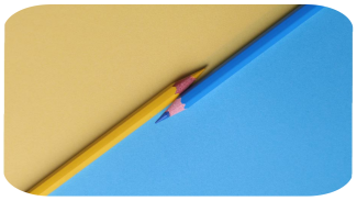 two pencils on a colorful background