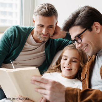two foster dads with a foster child