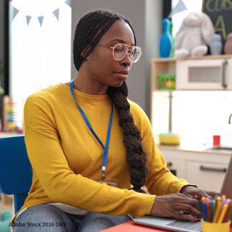 teacher at desk
